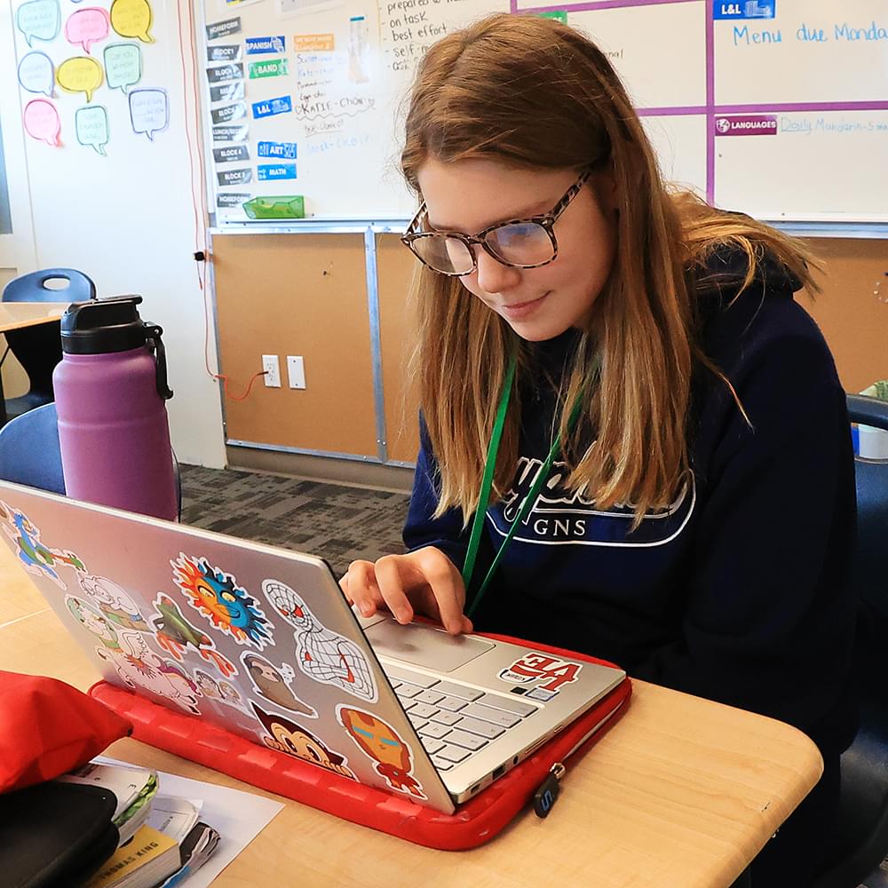 Middle School student using #winatsocial