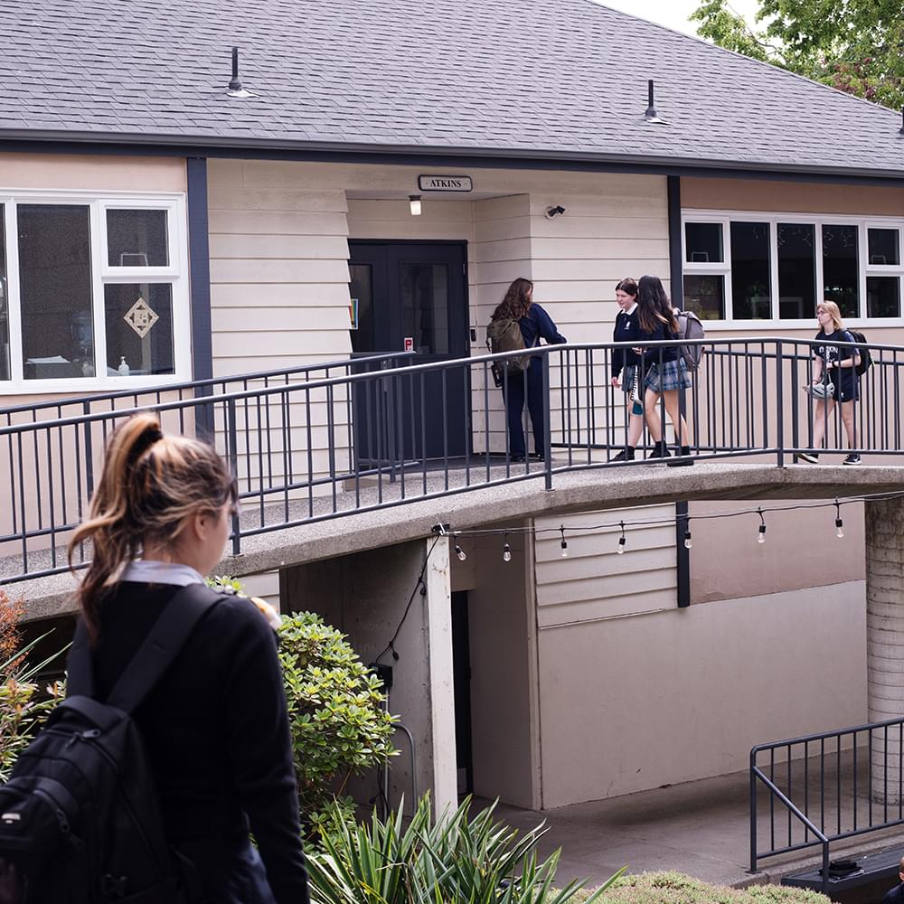 Students walking across school campus