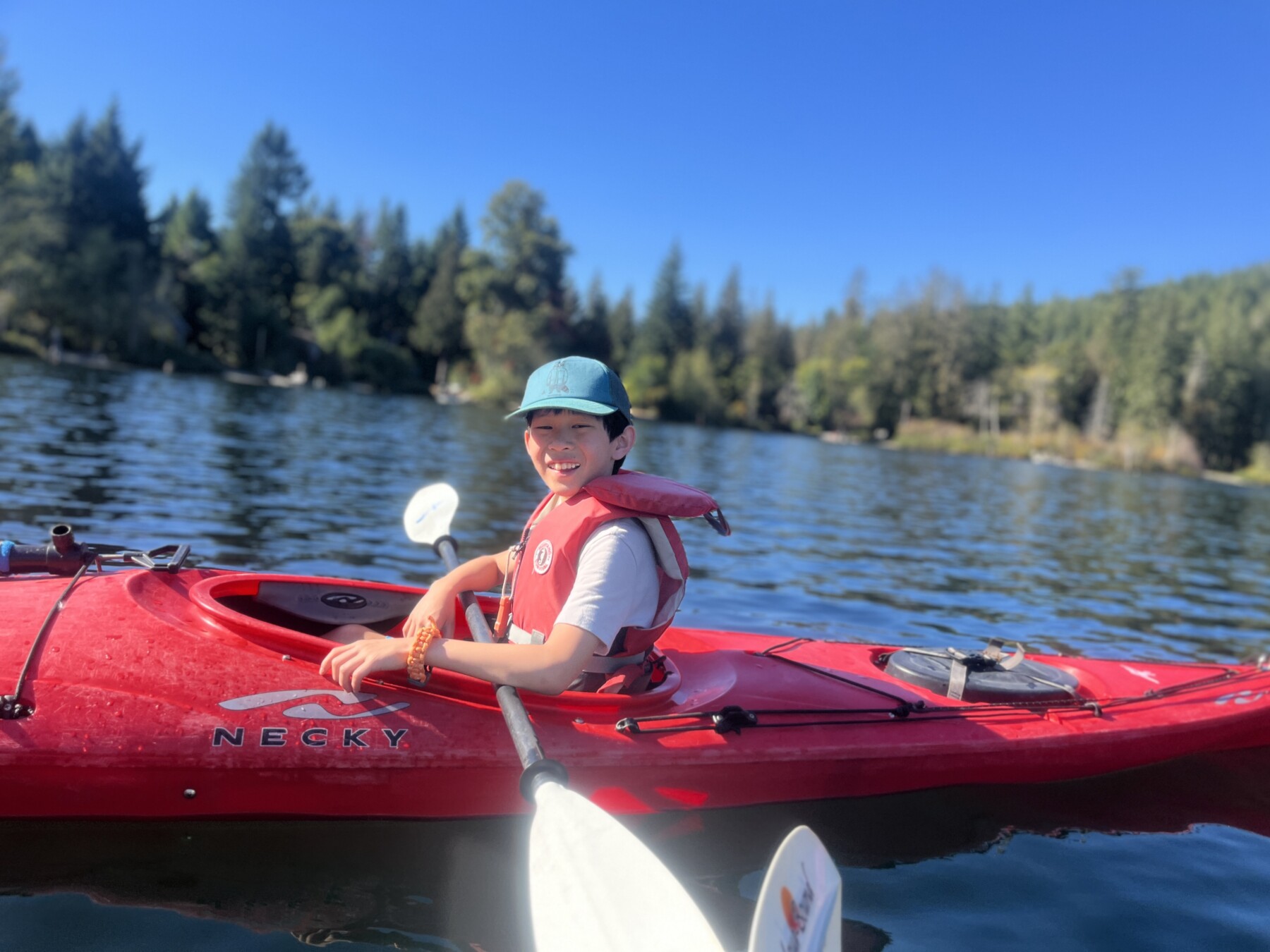 gns student in red canoe