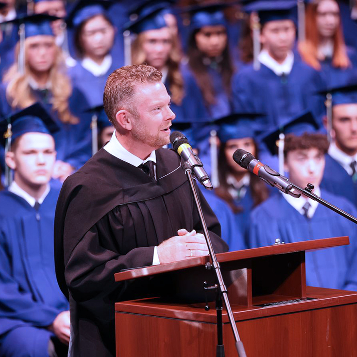 Chad speaking at Grad