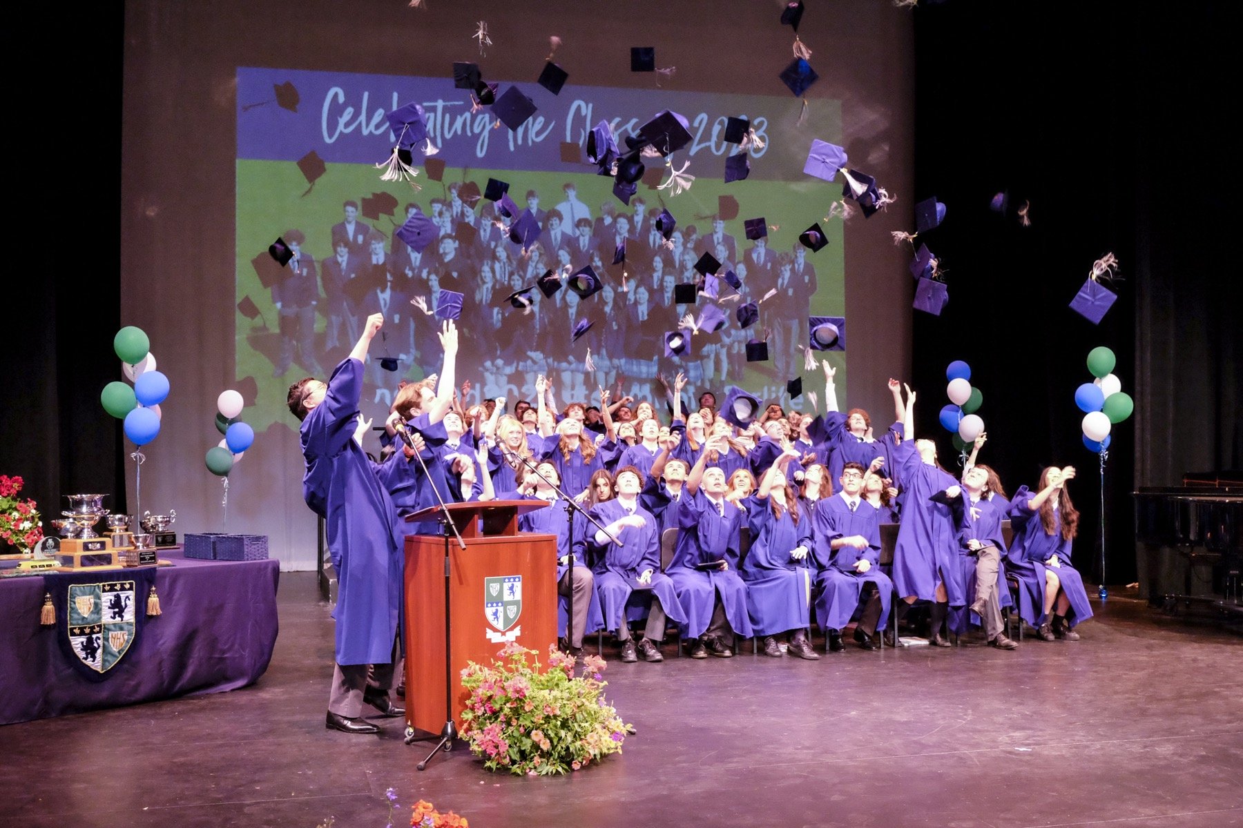 gns grads throwing hats in air