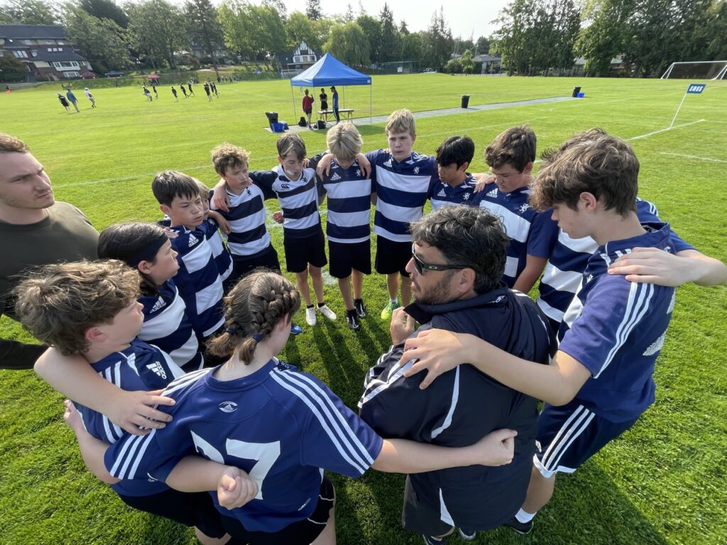 gns students in field standing in circle