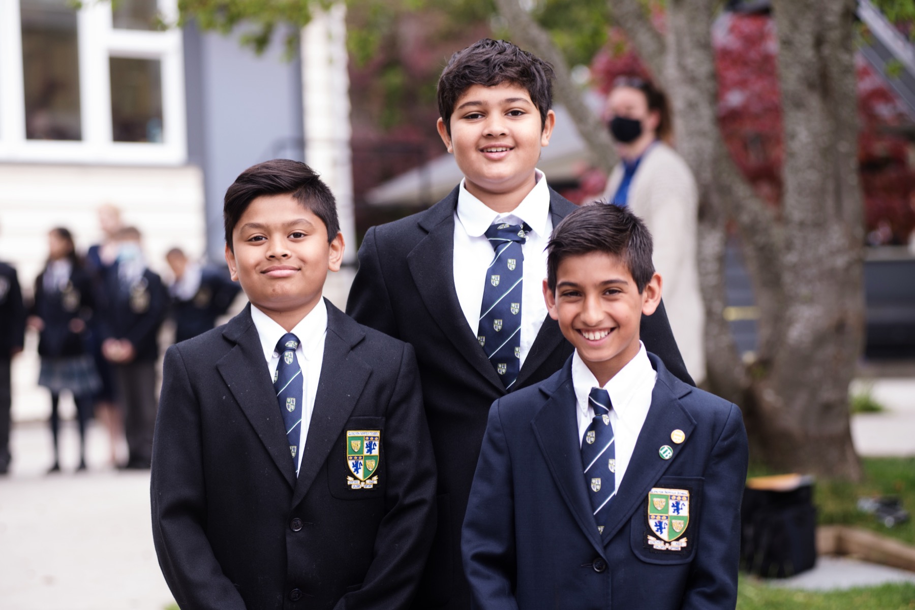 3 gns students in suits