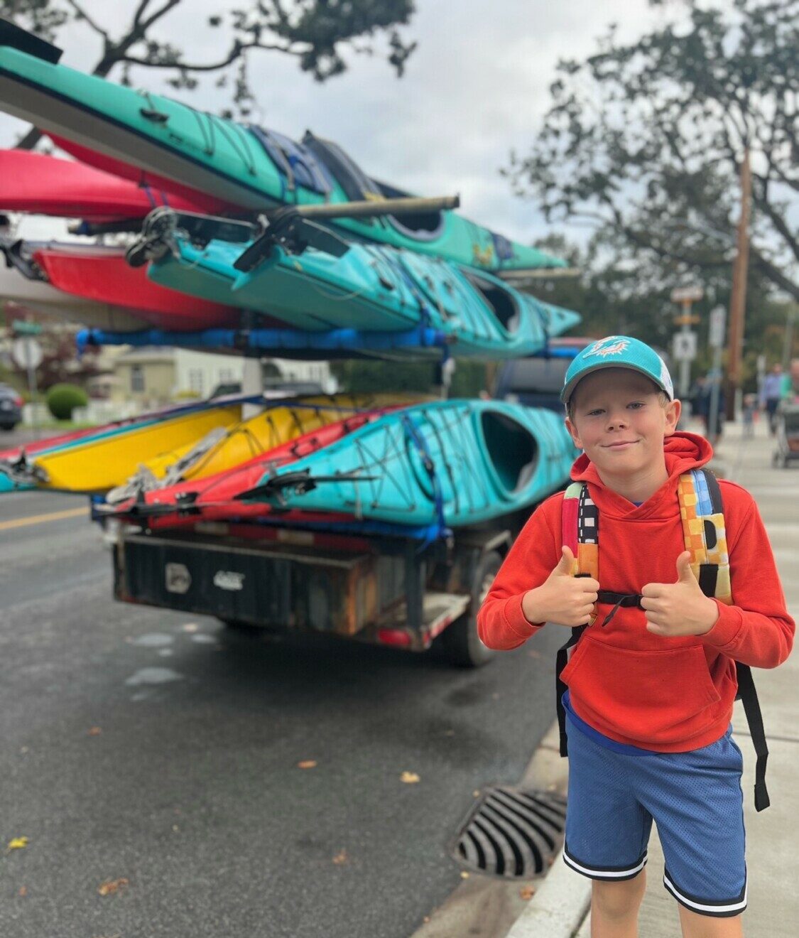 student by kayaks truck