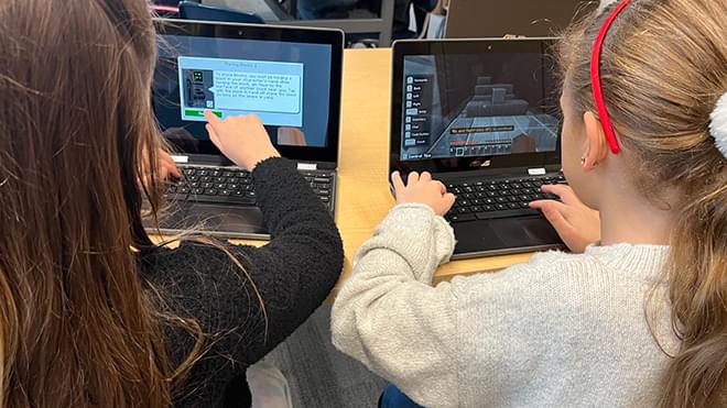 Junior School students exploring coding