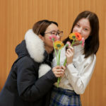 Students at GNS deliver flowergrams for Valentine's Day to raise money for Wild ARC.