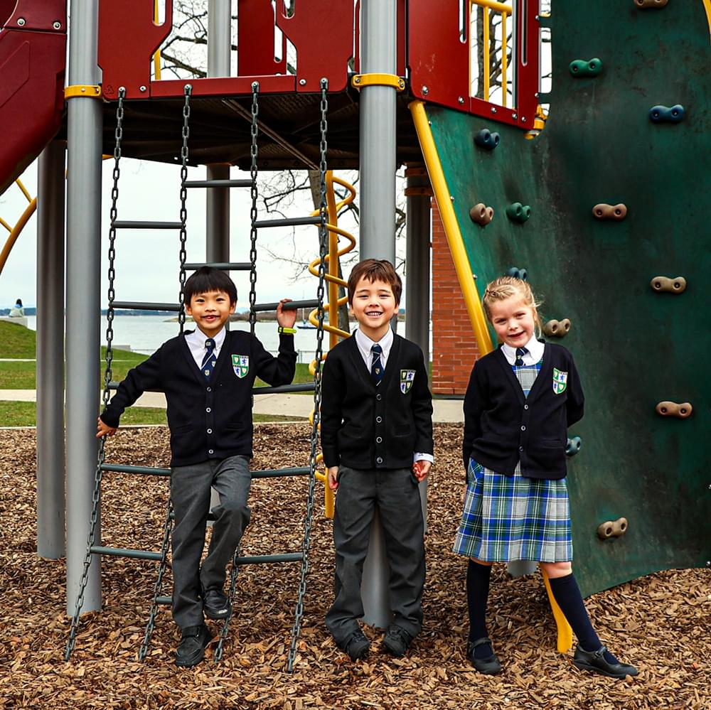 Junior School students by climber