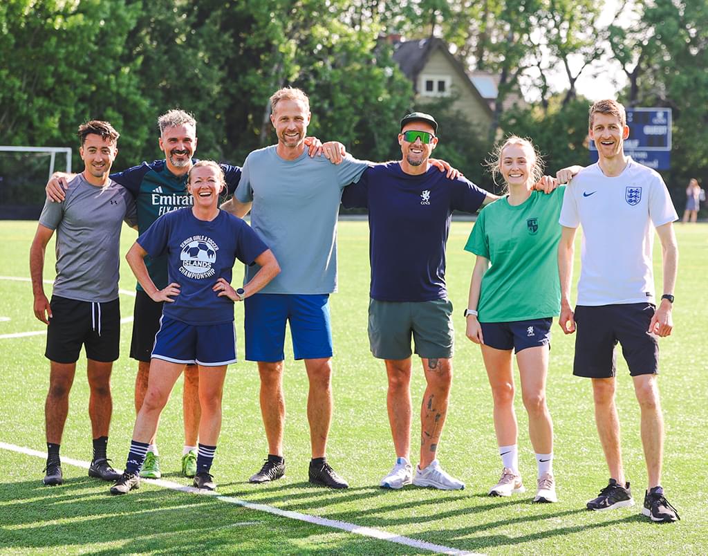 Group of staff on turf field