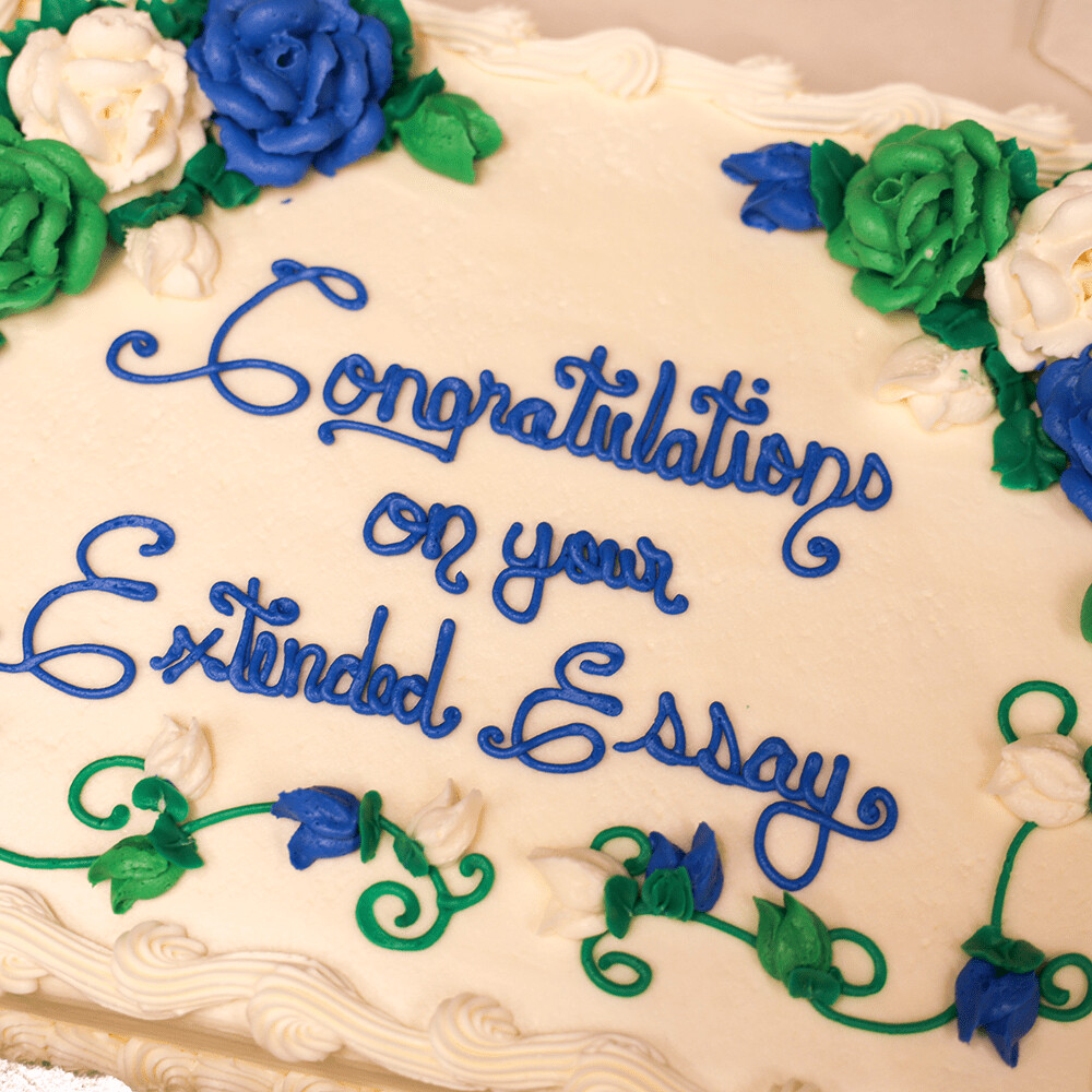 A cake that says "Congratulations on your Extended Essay