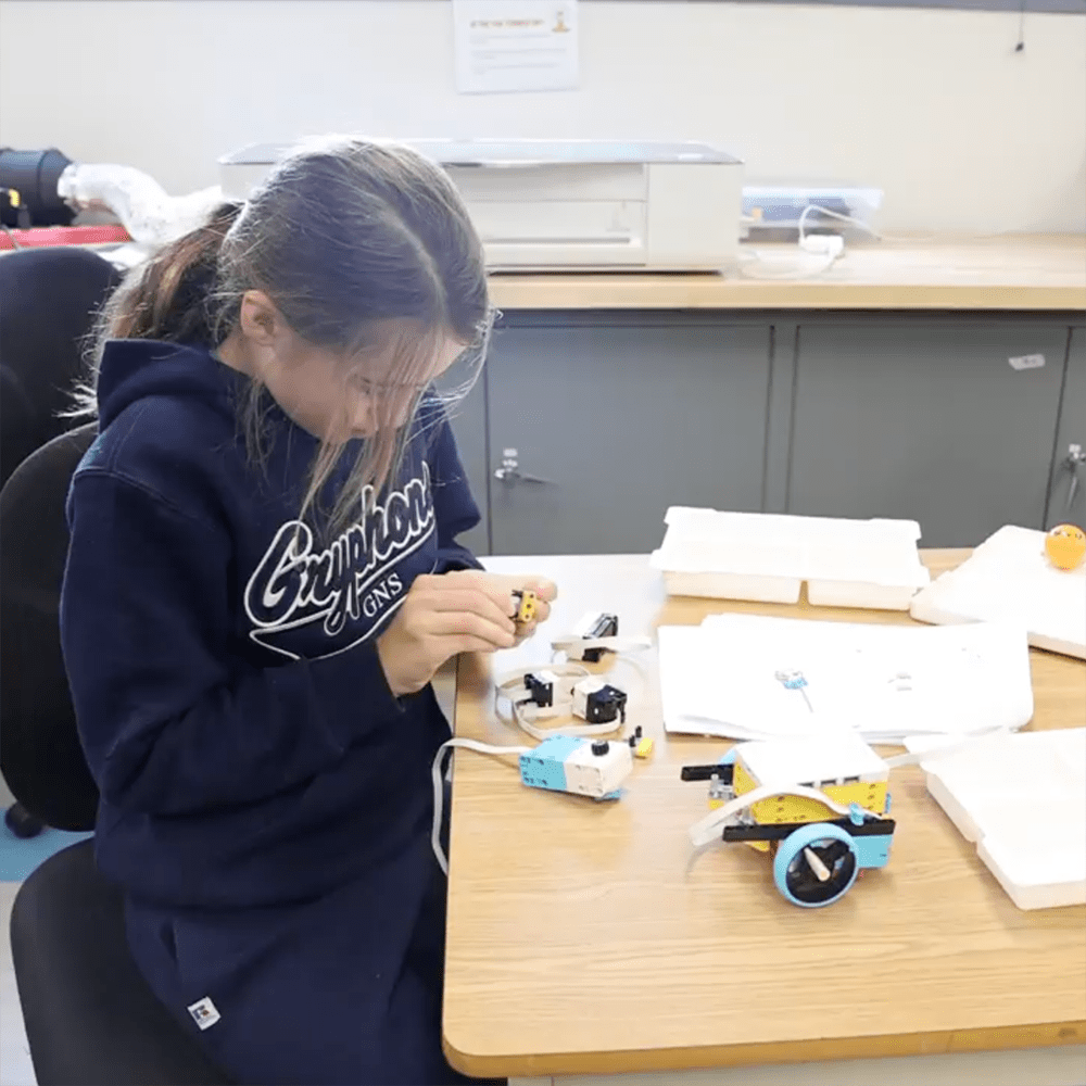 Student working with robotics