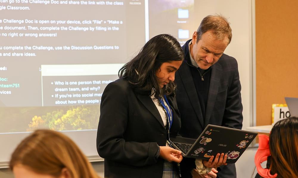 Middle School Principal helping a student