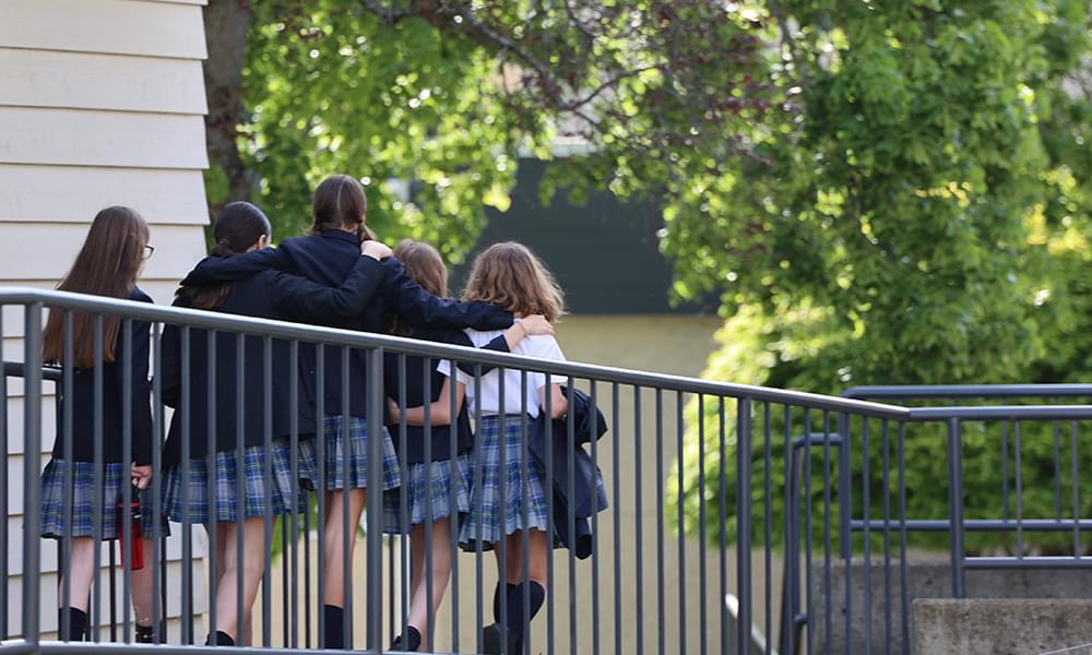 Middle School students walking on campus