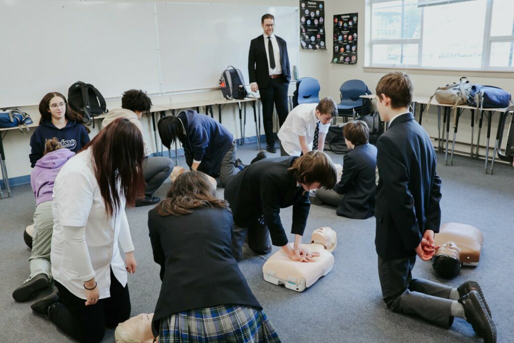 students learning CPR training