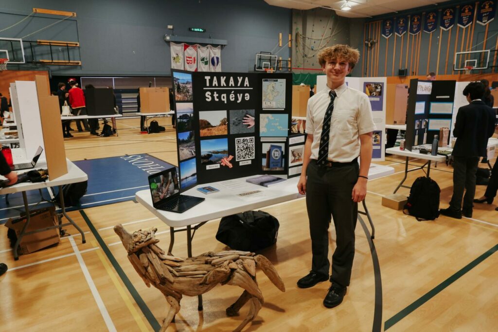 Student with project is featured