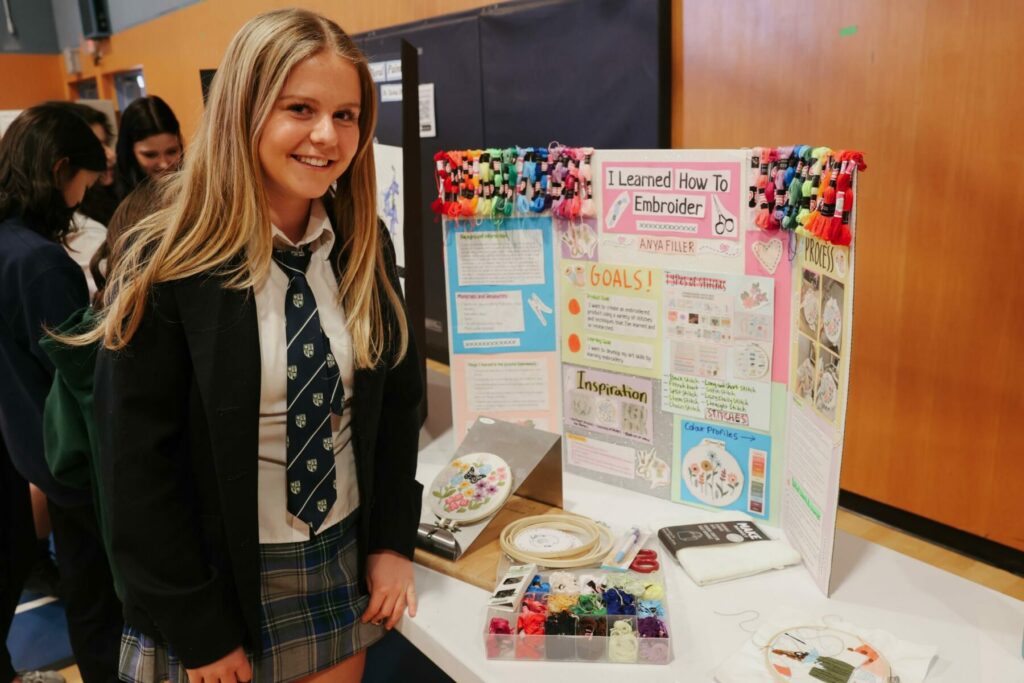 Student with project is featured