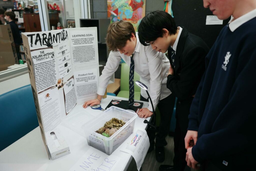 Student with project is featured