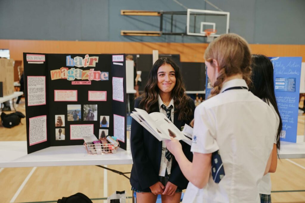 Student with project is featured