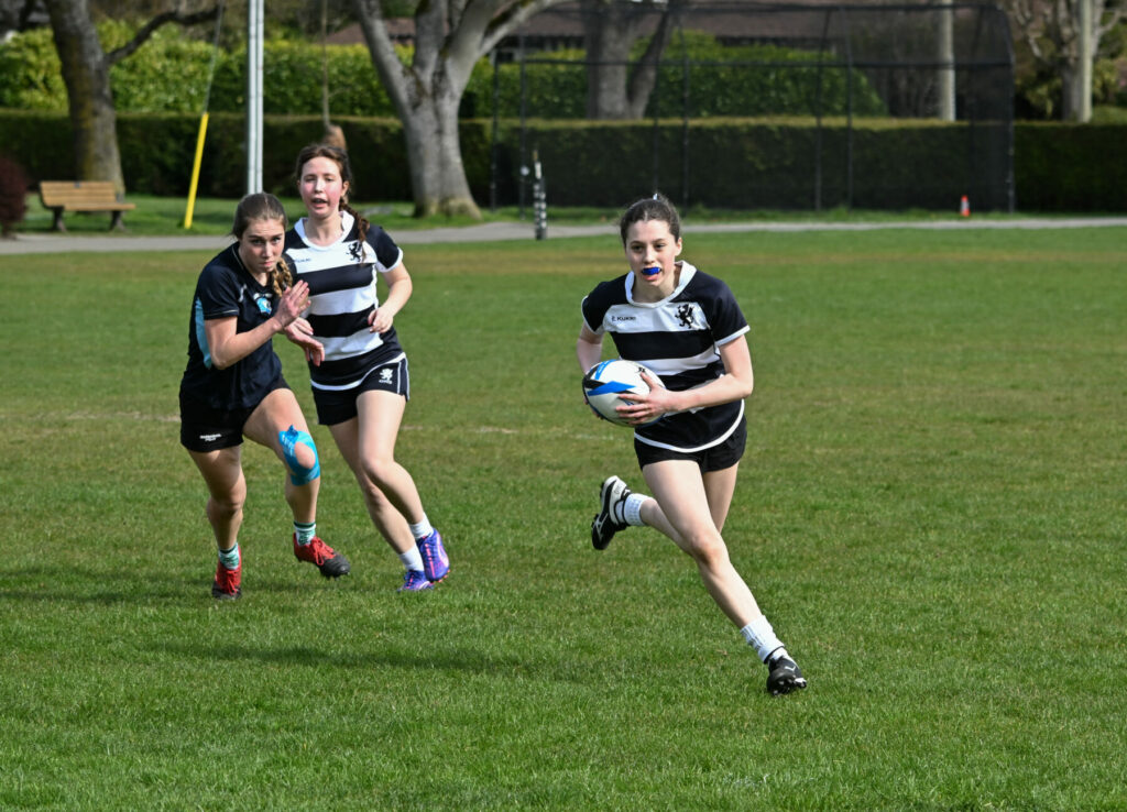GNS girls playing rugby