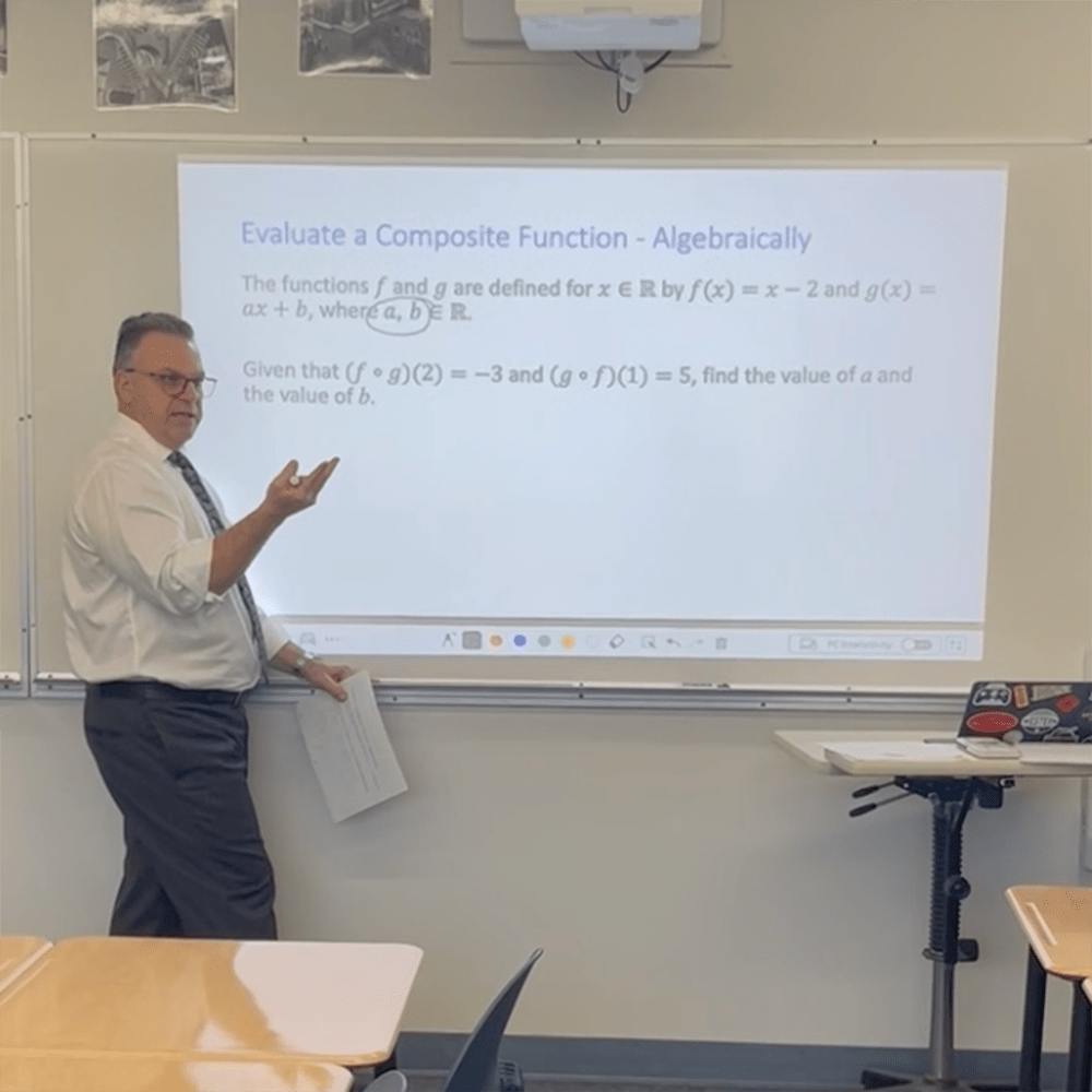 Pat Giommi talking to students from whiteboard